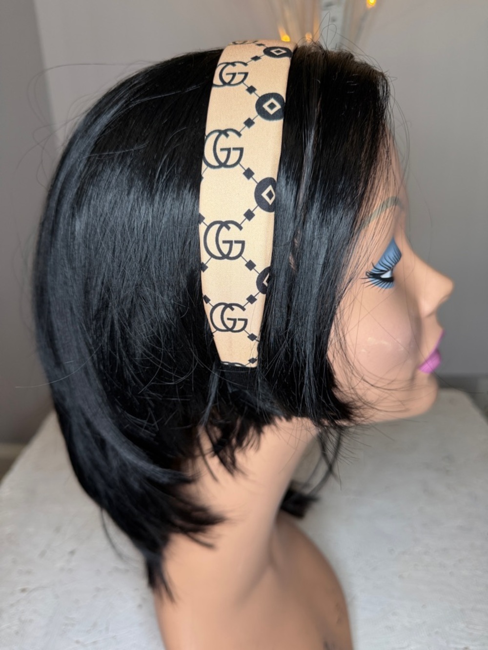 NWOT designer, logo, headband, tan, and black